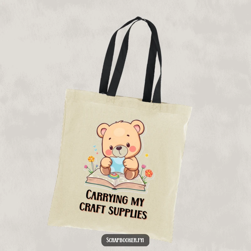 Funny bear tote bag with a bear carefully placing a sticker onto a colourful page, great for crafters. Ideal gift.