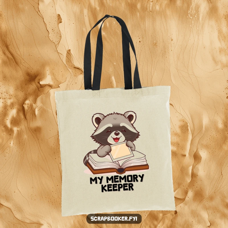 Funny Raccoon Tote Bag showing a delighted raccoon pasting a photo into a book, ideal for carrying craft supplies.